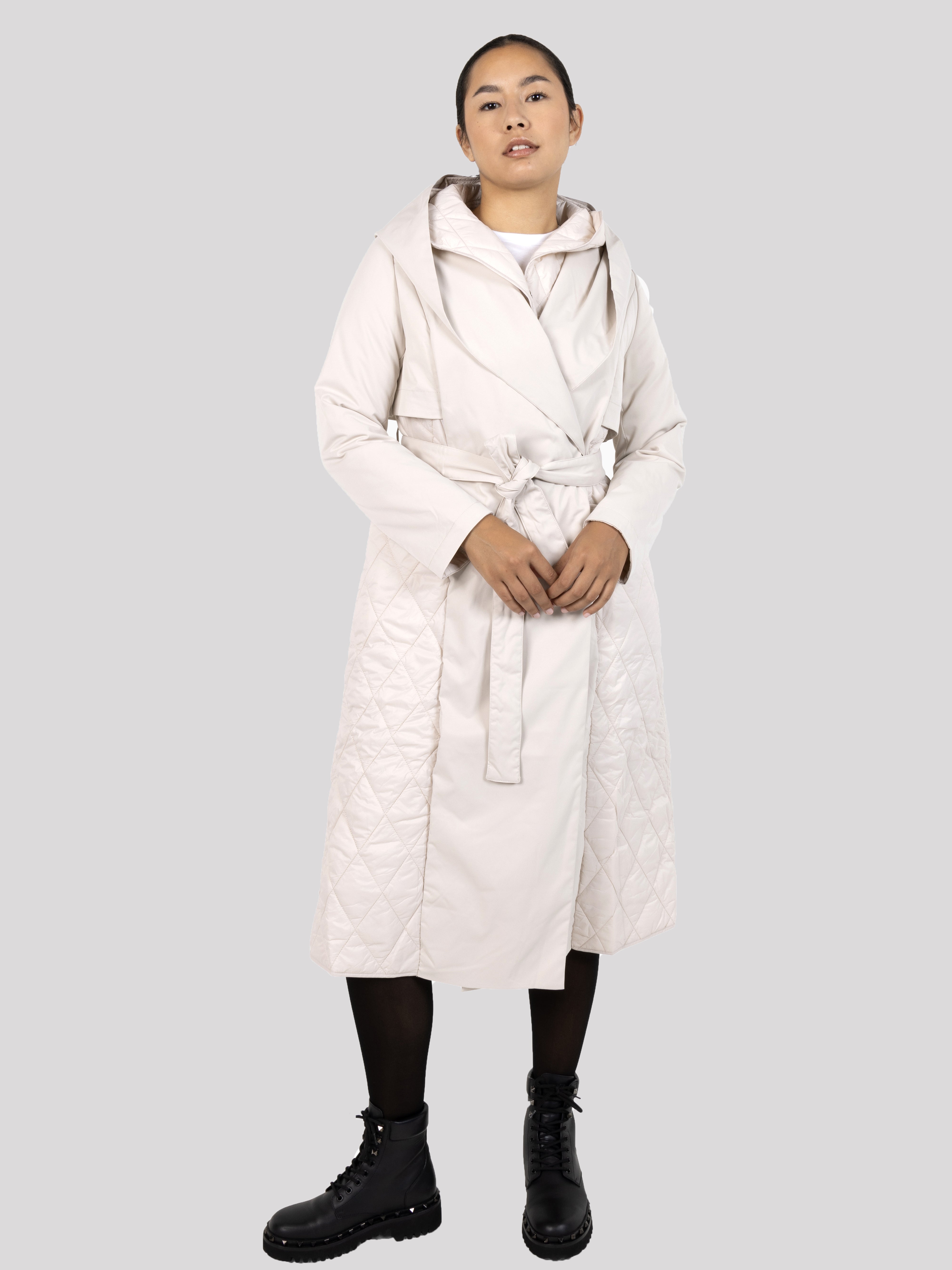 Elegant black quilted women's coat with belt